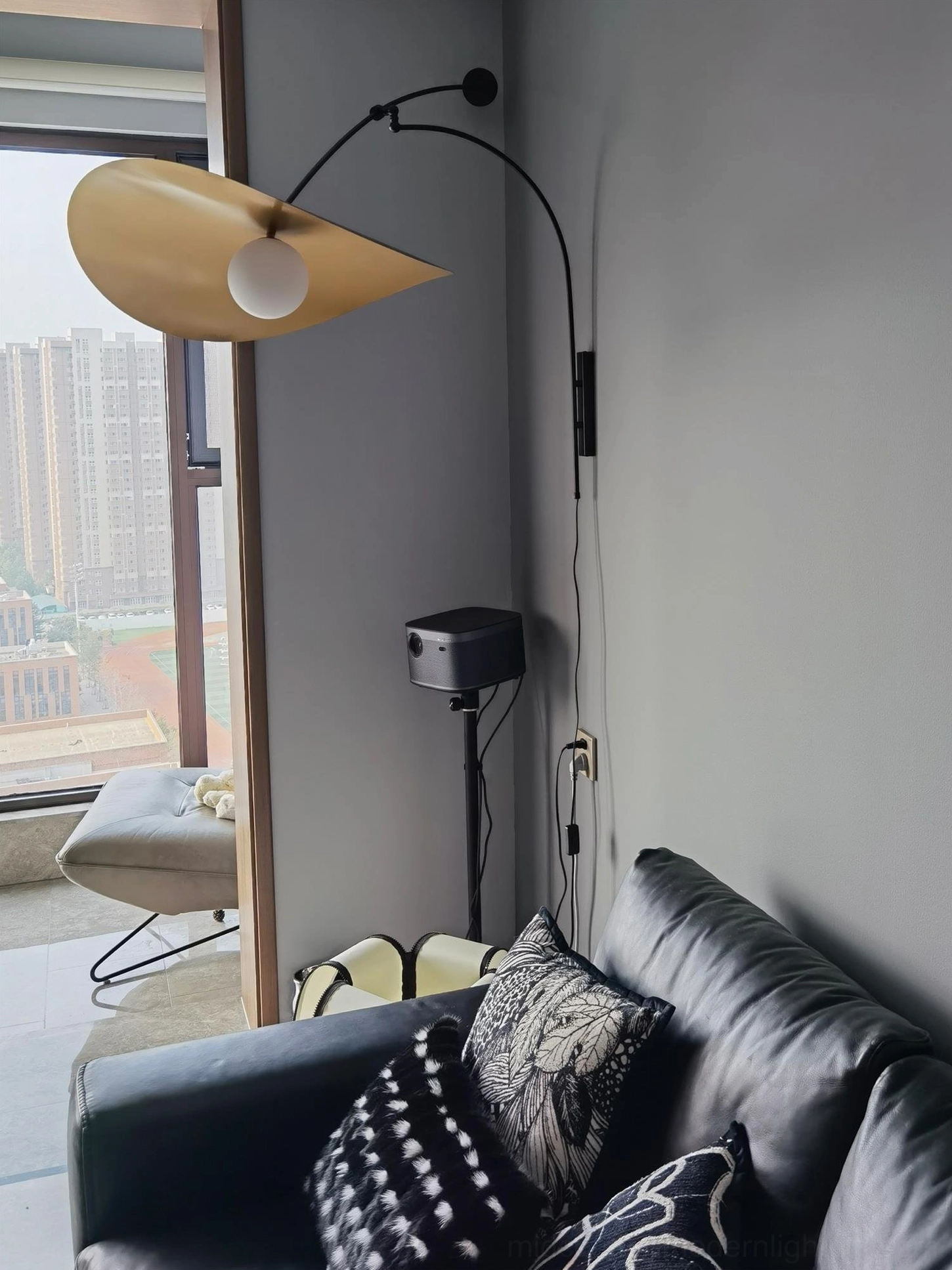 Myrna plug-in wall lamp beside bed, reading light sculptural bedroom accent