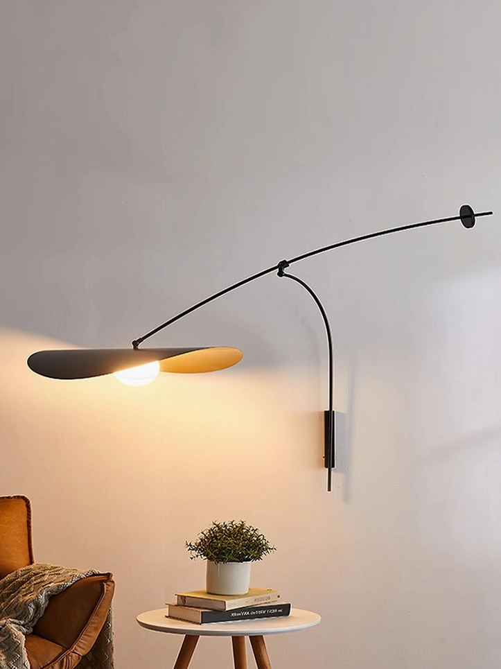Myrna sculptural wall lamp, organic botanical forms inspired design, black and gold finish detail