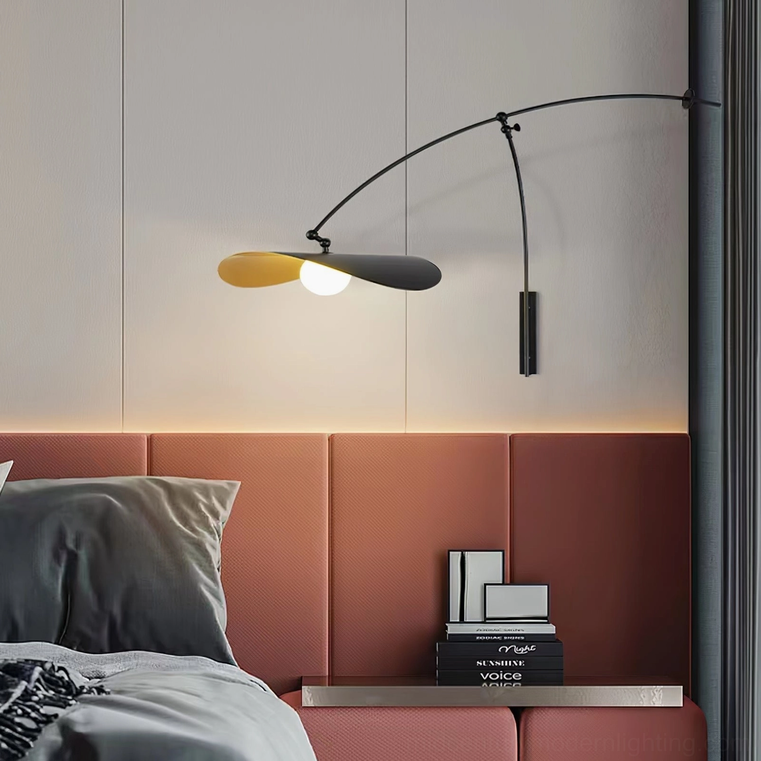 Myrna wall lamp mounted on master bedroom wall with red tufted headboard, warm minimalist interior