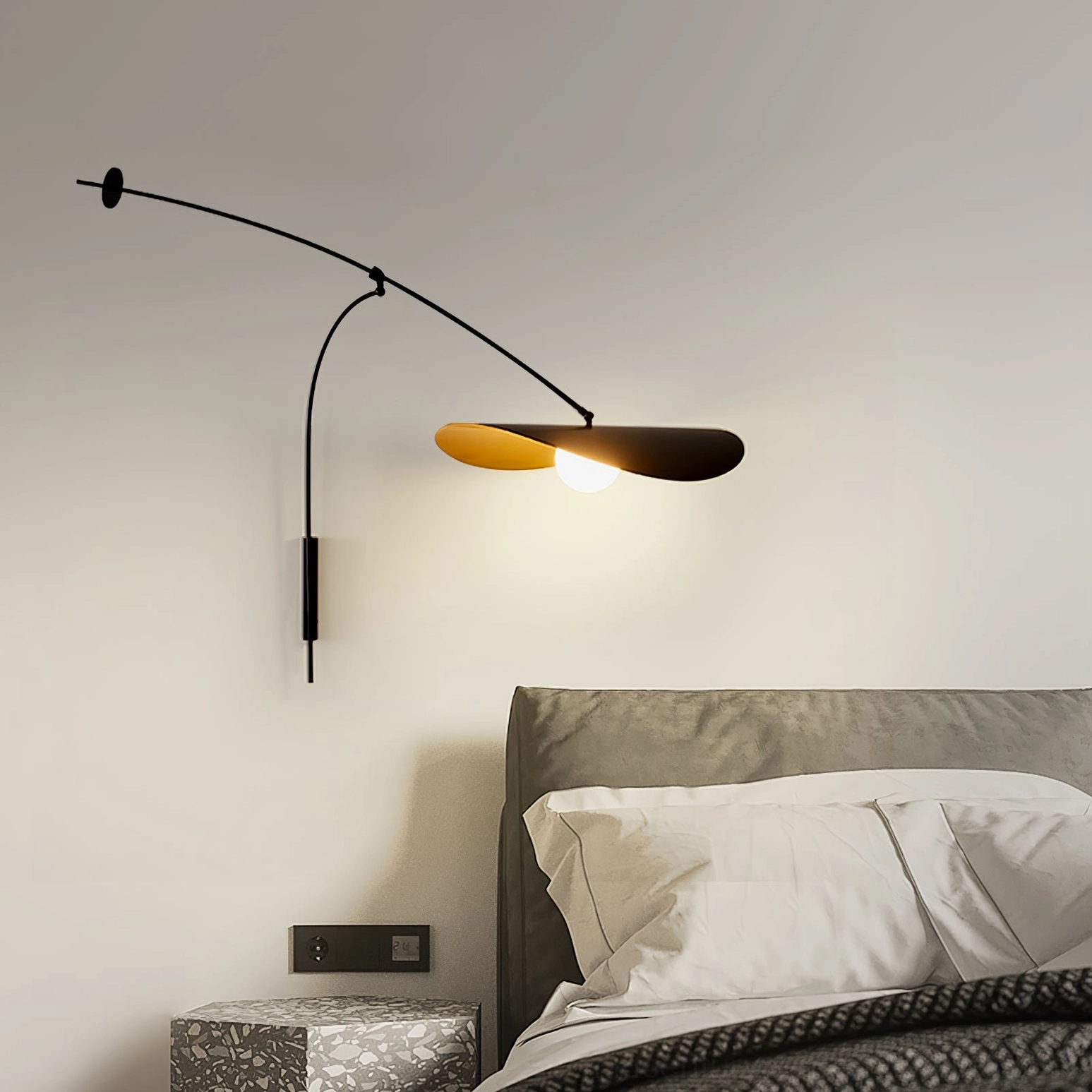 Myrna wall lamp in contemporary bedroom with gray bedding, sleek minimalist black curved design