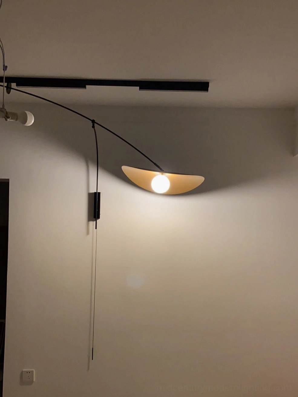 Myrna sculptural wall lamp negative space design, light and shadow play architectural