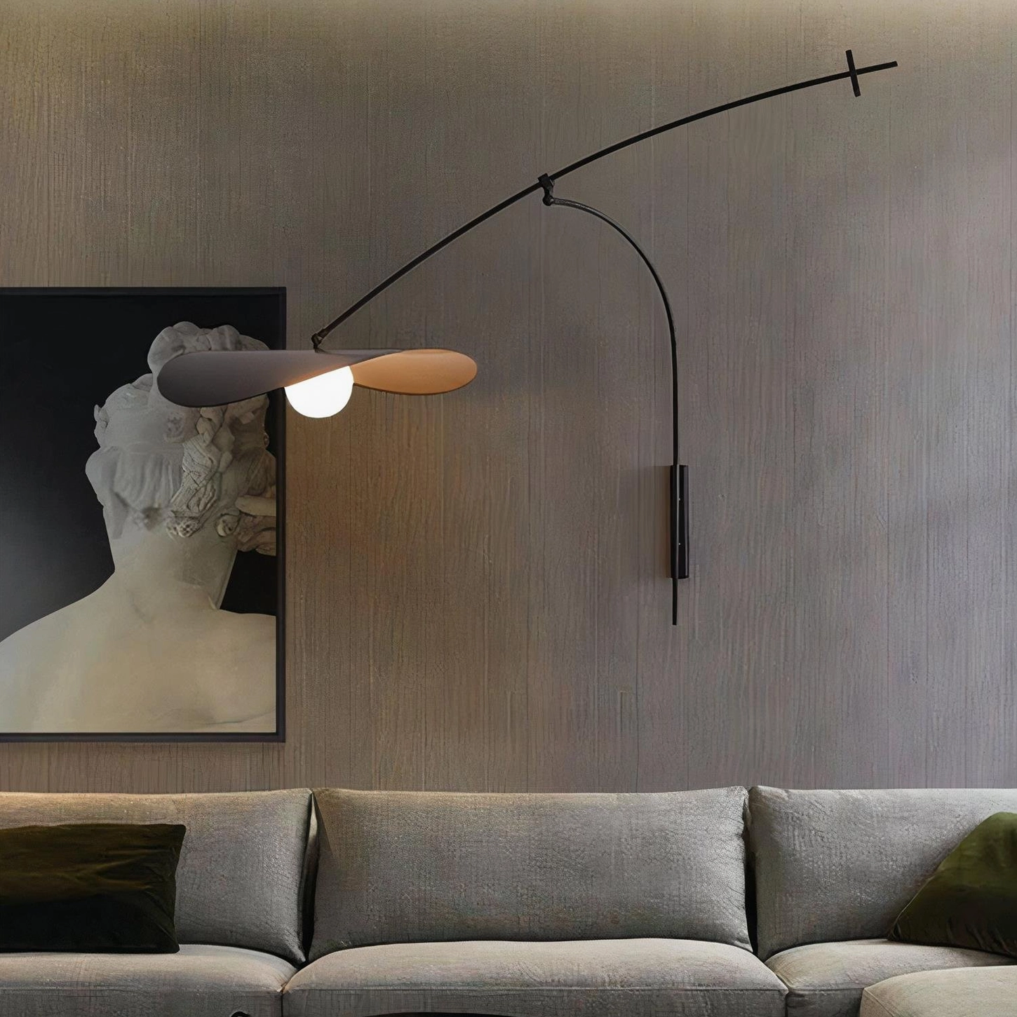 Myrna wall lamp shadow casting on interior wall, dynamic lighting effect sculptural form