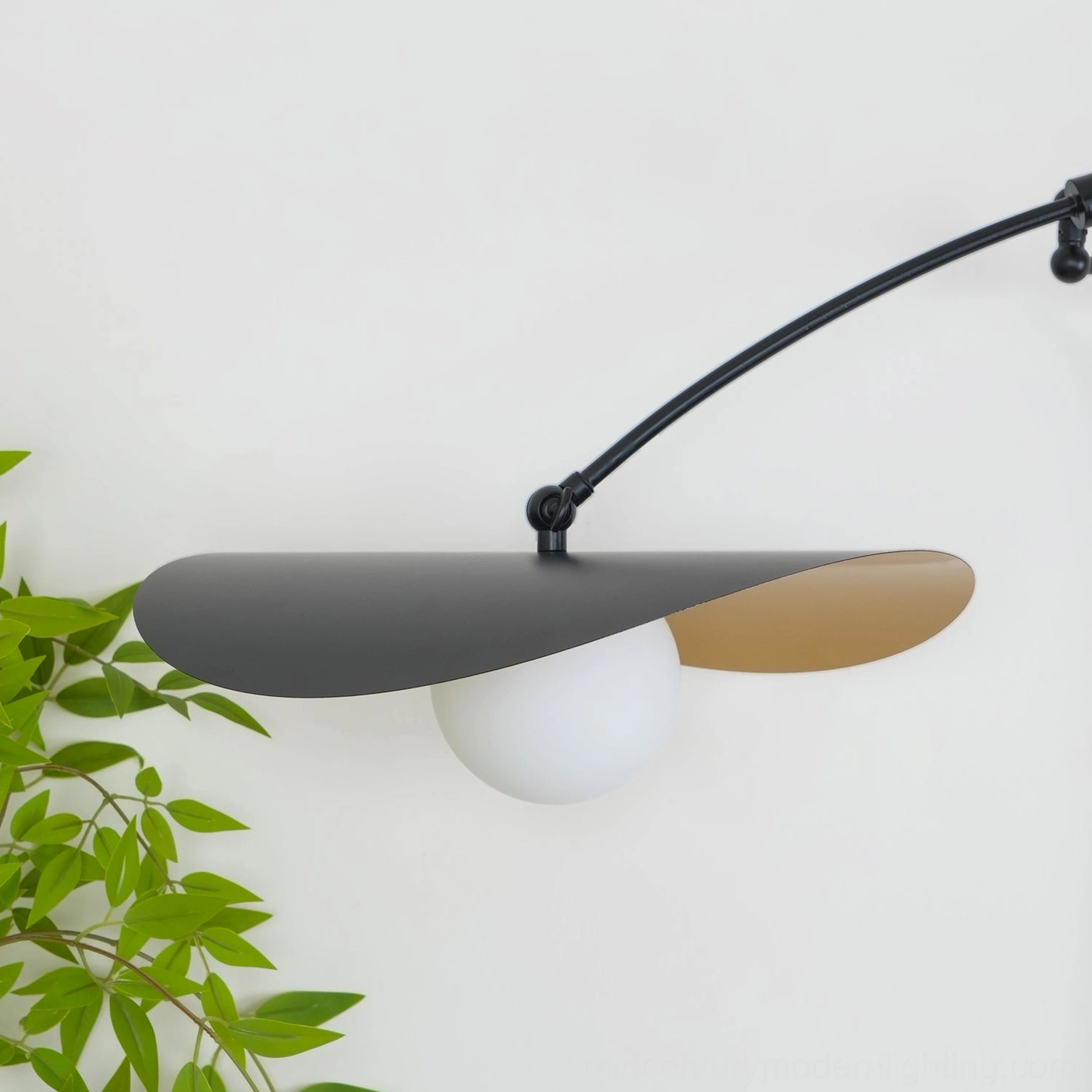 Myrna wall lamp sizing comparison, compact versus statement size options