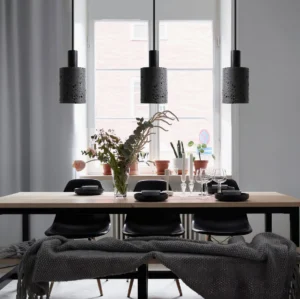 Three N Stone Pendant Lamps suspended in modern Nordic dining room with neutral minimalist interior design