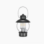 N80 cordless LED lantern with black finish and tempered glass panels, front studio view showing classic lantern design