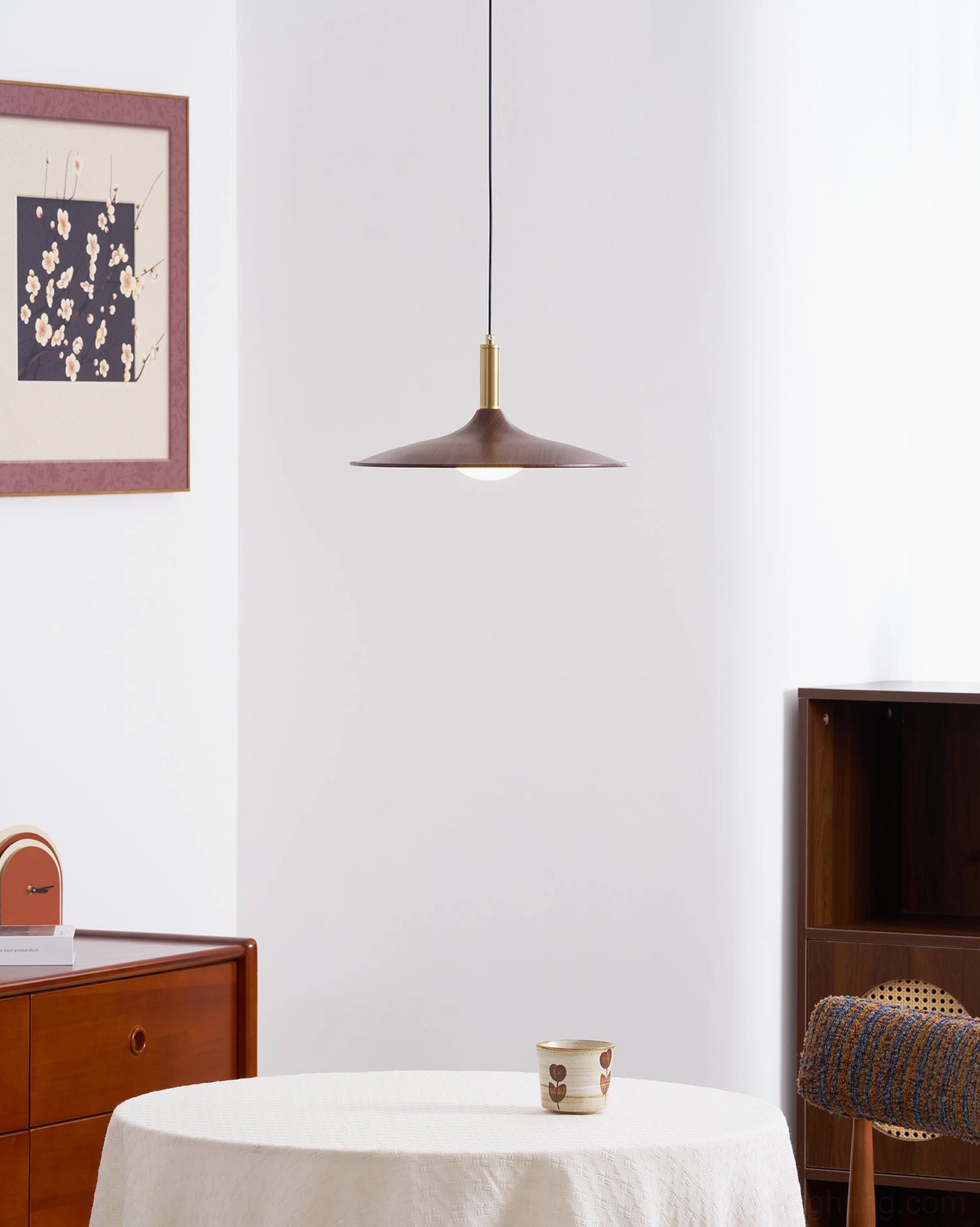 Disc shaped matte pendant light side profile small round dining area modern minimalist