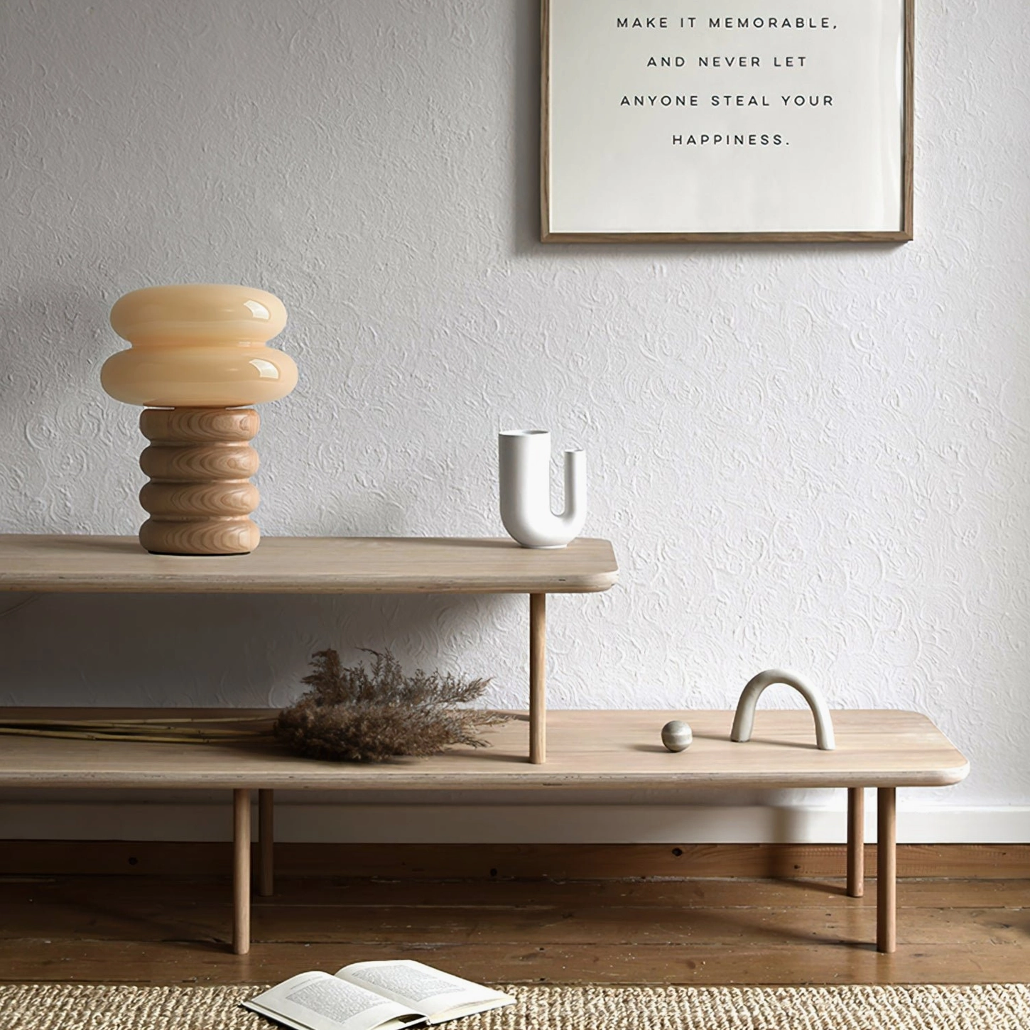 Soft-lit Napako minimalist table lamp creating warm ambient glow suitable for contemporary Scandinavian interior styling