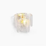 Nason brass wall sconce with rippled waterfall glass shade, front view on white background showcasing luxury mid-century modern design