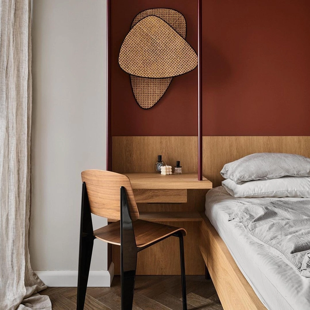 Natural bamboo rattan wall lamp close-up showing intricate hand-woven cannage detail and sustainable materials