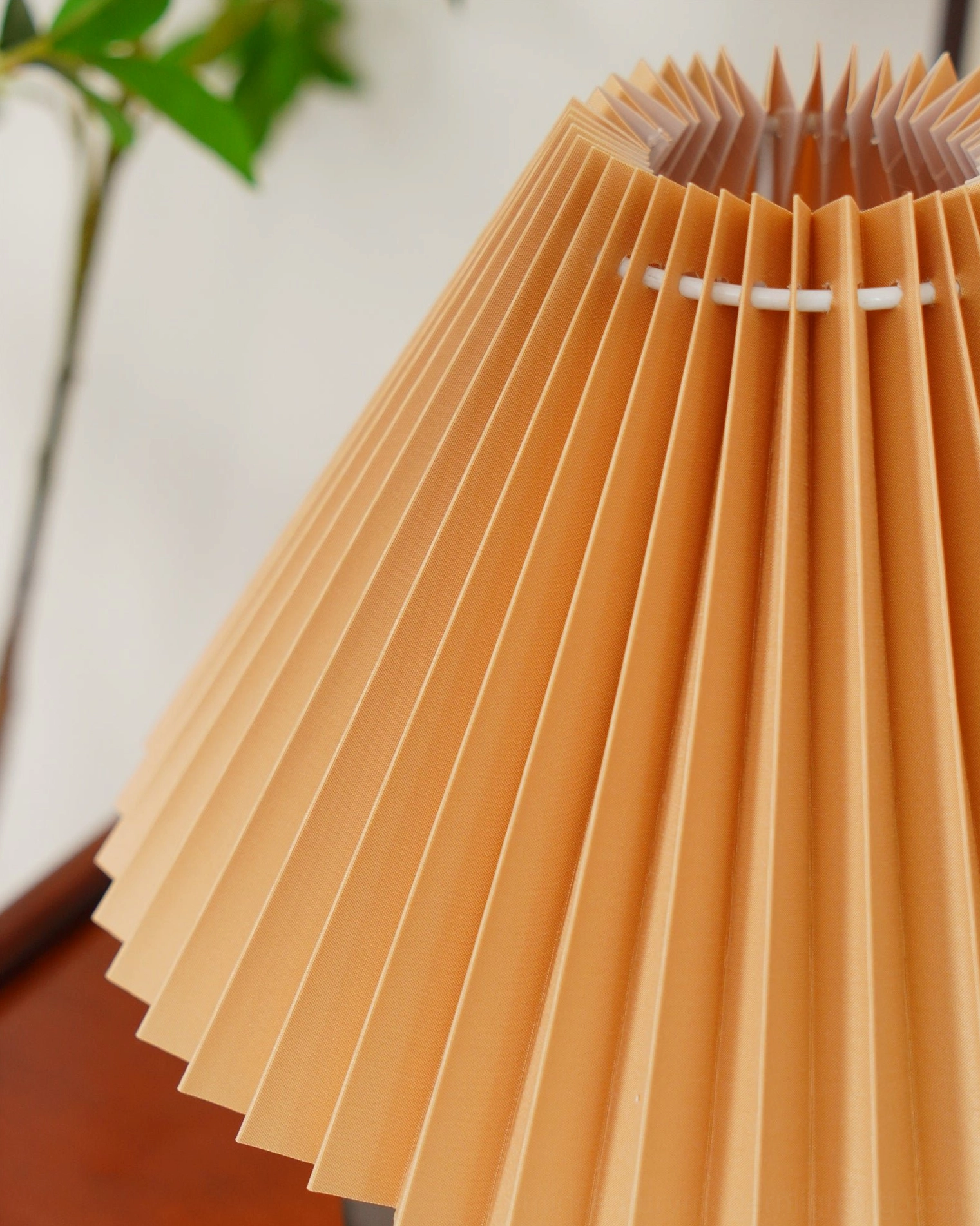 Navia pleated table lamp with Edison bulb warm glow lighting ambiance