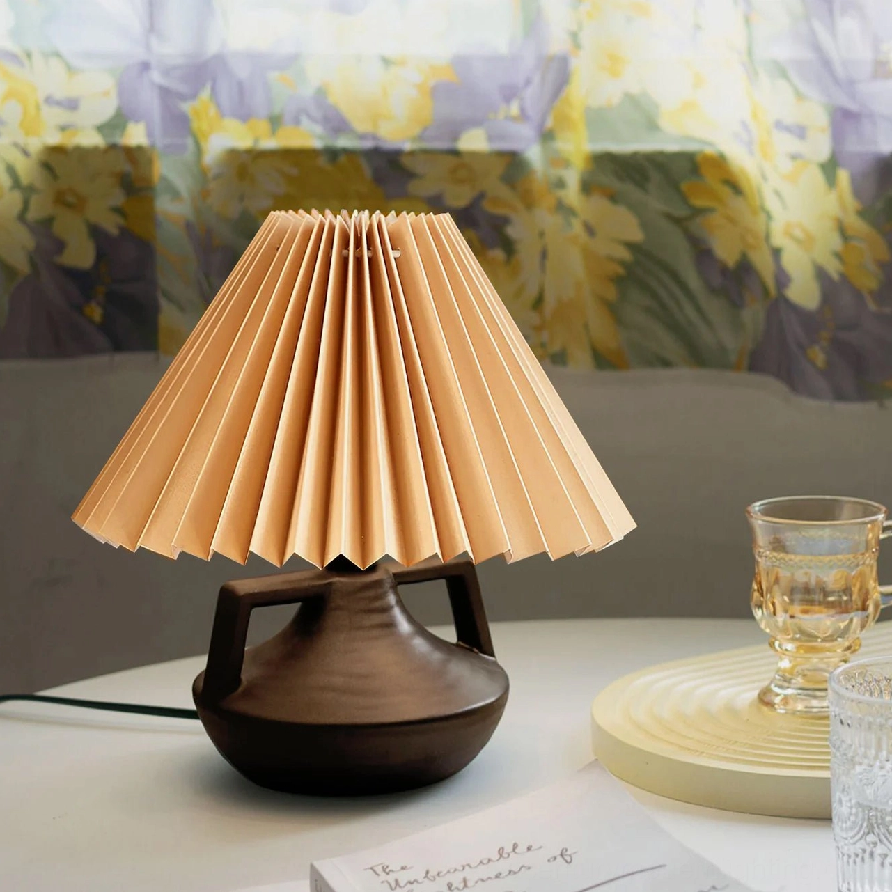 Navia pleated fabric lamp with glass cup and ridged placemat, modern minimalist home style