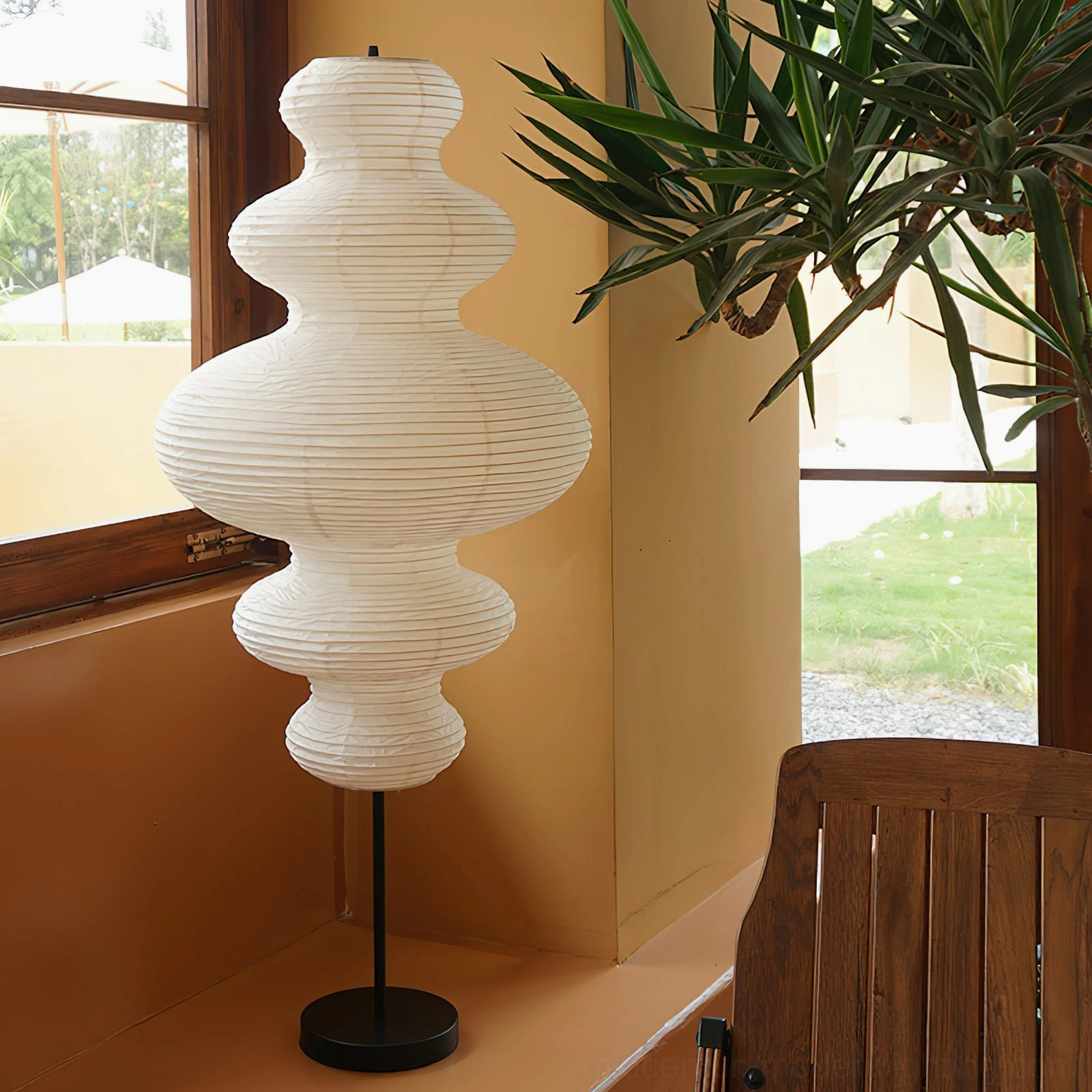 Neiko floor lamp paired with mid-century modern furniture and natural wood accents in curated interior