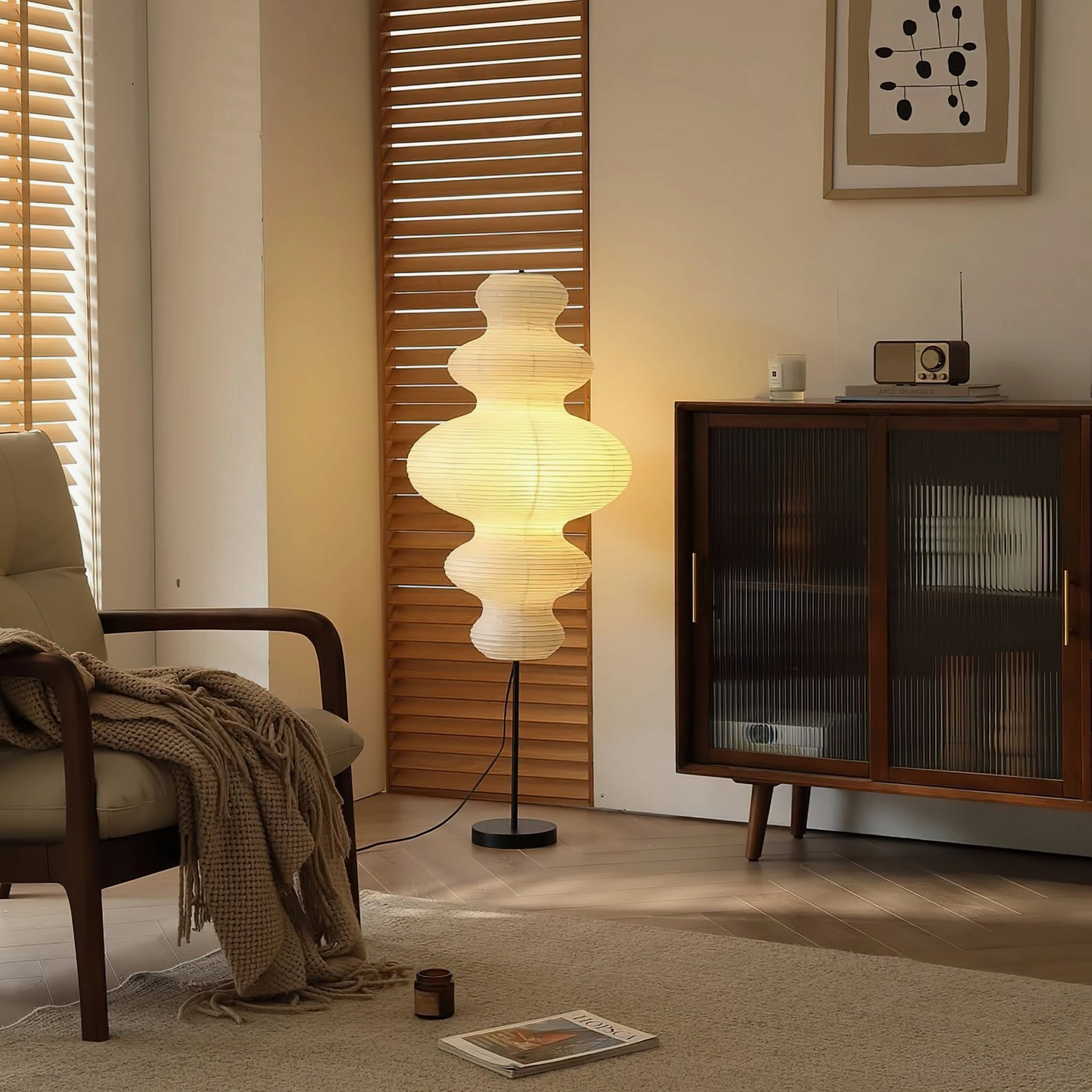 Neiko floor lamp three-quarter view in mid-century modern living room with wooden furniture and throw blanket