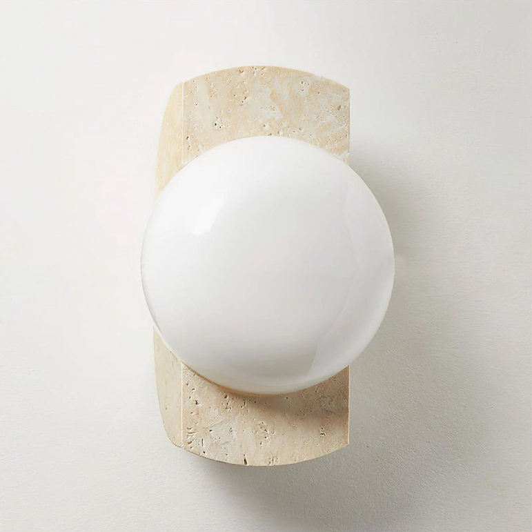 Neptune beige travertine wall sconce with white glass globe - frontal view