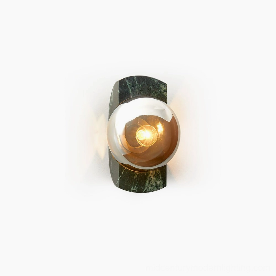 Neptune green marble wall sconce with amber glass globe - frontal product view