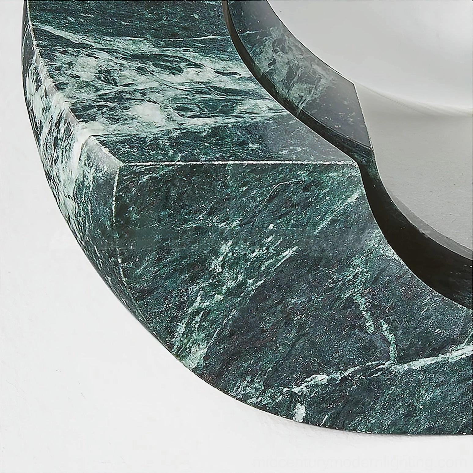 Neptune marble wall sconce base detail - texture and curved edge close-up