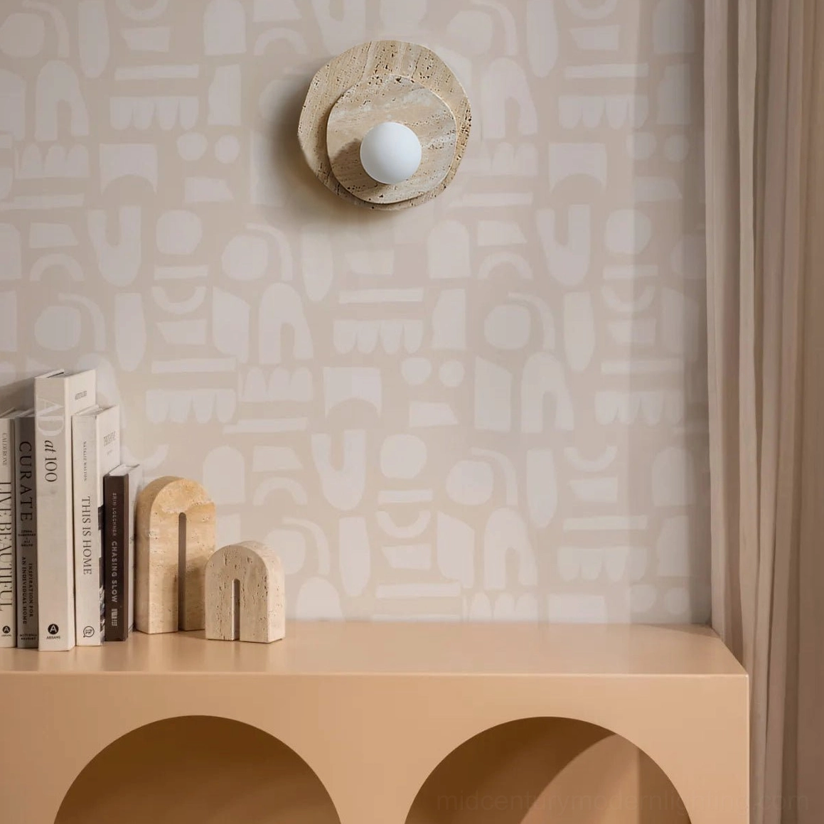 Ner travertine wall light installed in modern living room with console table, warm neutral home decor styling