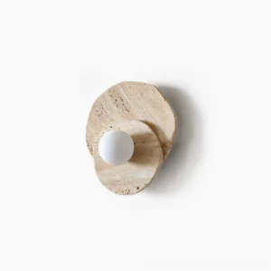 Ner natural travertine wall sconce with frosted glass diffuser, front view on white background showcasing organic asymmetrical stone texture