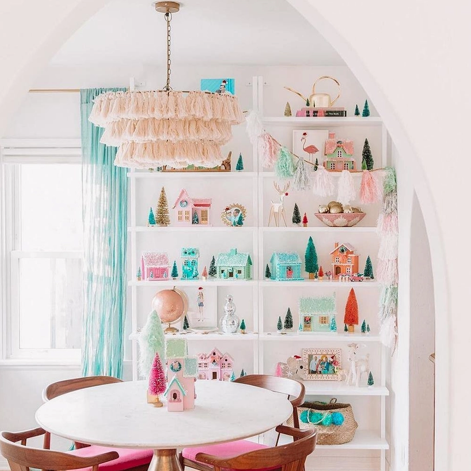 Off-white tiered tassel chandelier with neutral elegance blending seamlessly into minimalist boho interior