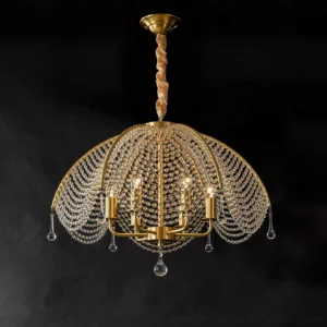 Neville crystal brass chandelier angled perspective view highlighting scalloped design against dark gray backdrop