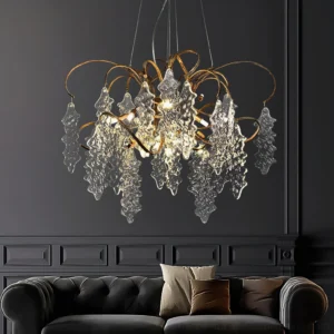 Niagara chandelier installed in luxury living room above tufted sofa showing warm ambient lighting