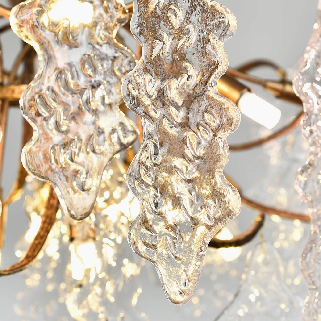 Niagara Chandelier product photography showing complete fixture with brass metalwork and clear glass