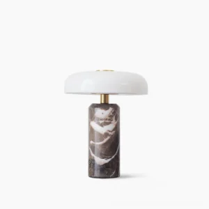 Nico cordless marble table lamp with dark veined base and white frosted mushroom glass shade on white studio background
