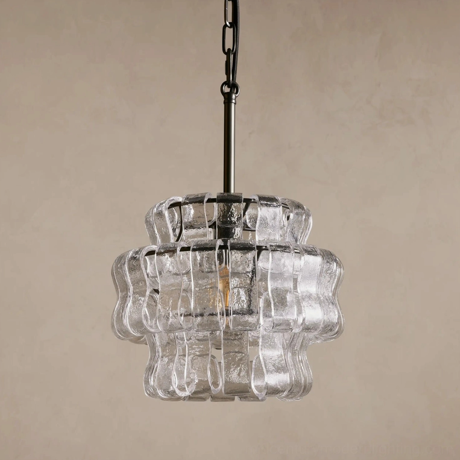 Clear rippled glass Nirsa pendant with dark bronze hardware unlit fixture detail