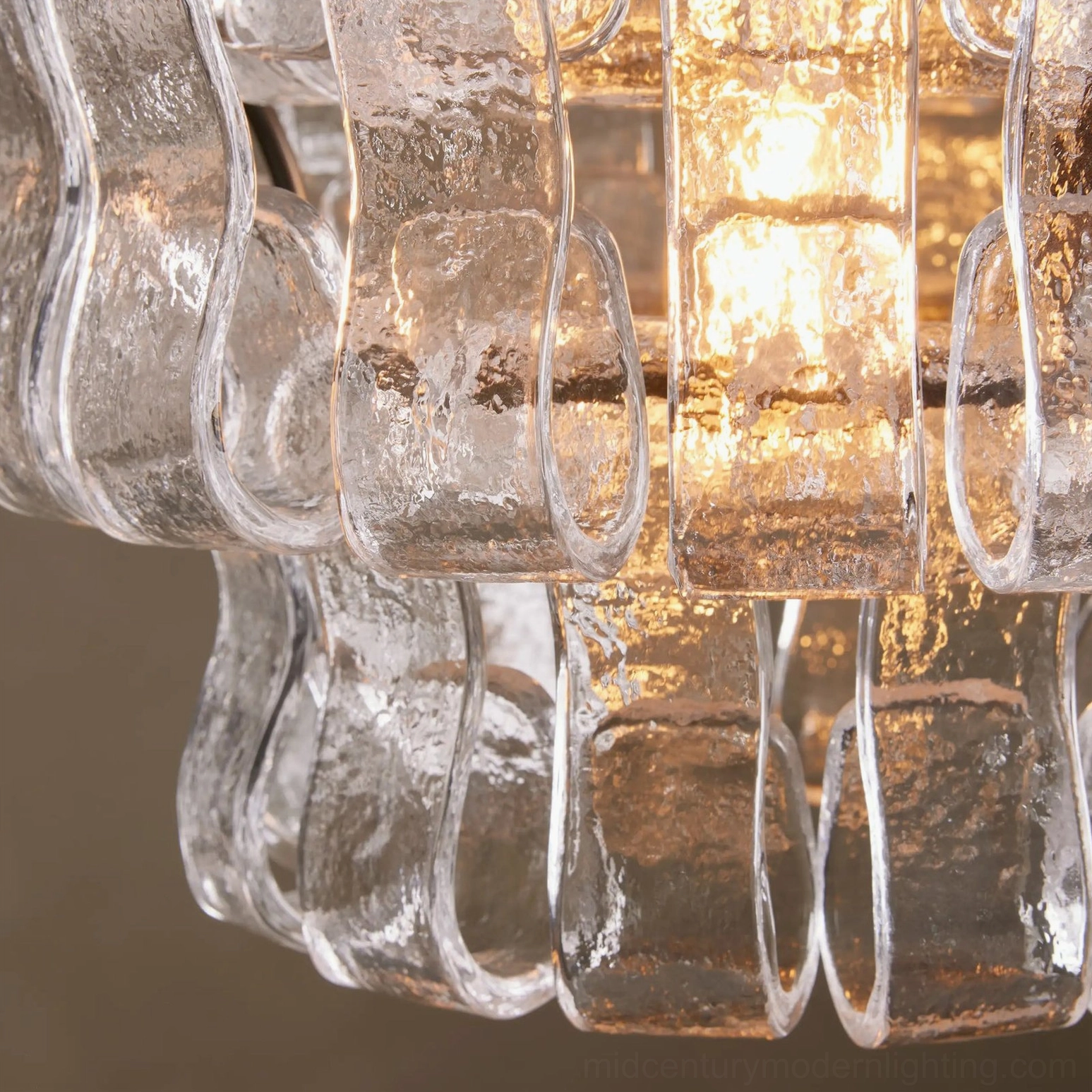 Multi-angle view of Nirsa pendant light rippled glass construction and metal mounting