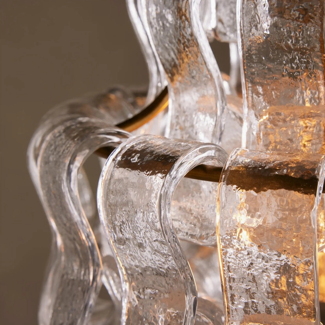 Nirsa wave glass pendant light showing textured surface detail and cascading panel design