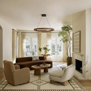 Niseko pendant hanging in contemporary American living room with marble fireplace and warm neutral palette