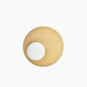Single Nodes angled wall lamp with warm brass finish and spherical frosted milk glass shade front view