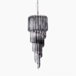 Noir spiral chandelier with precision-cut smoke gray glass tiers, front studio view showing geometric cascade design