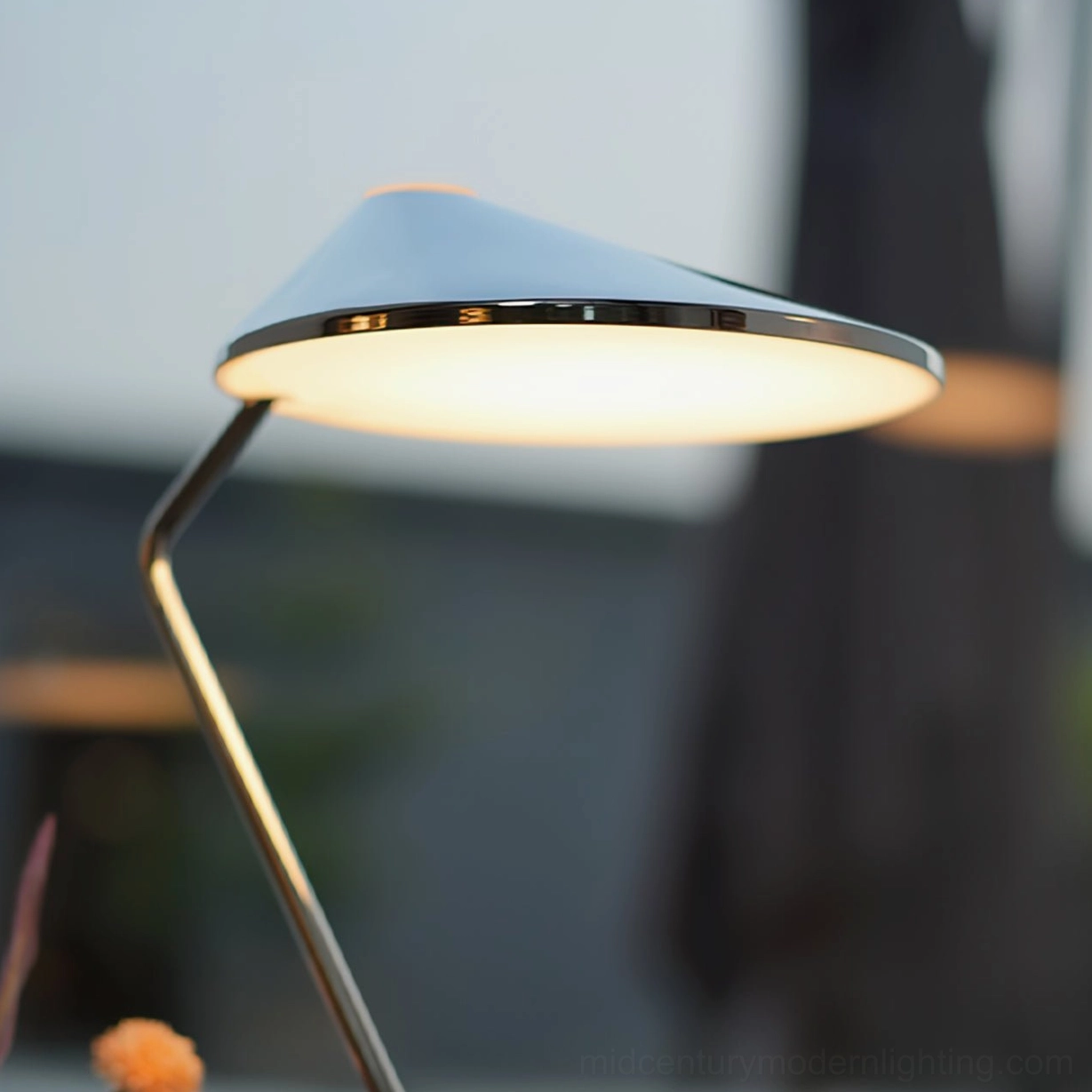 Glowing chrome desk lamp side view ambient warm lighting indoor