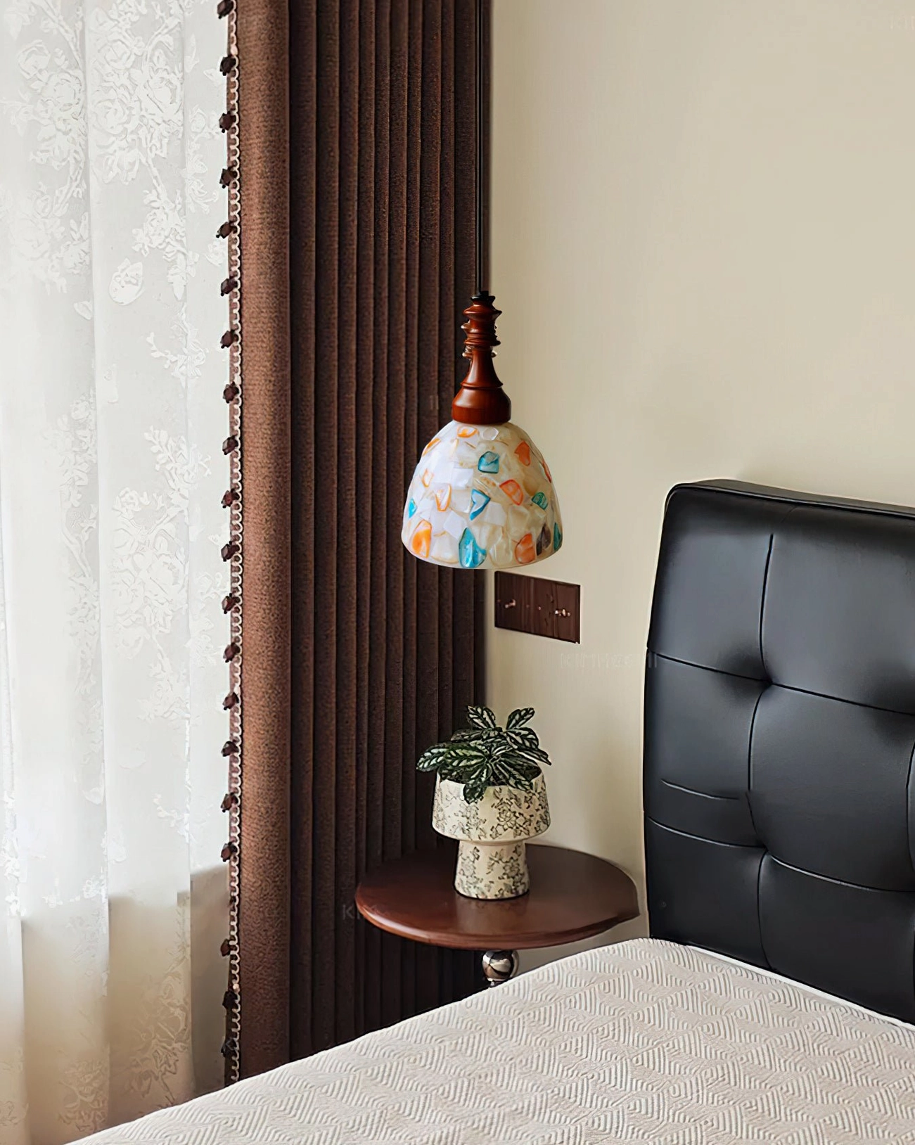 Nonna stained glass pendant light in warm master bedroom setting, vintage lighting above bed with soft ambient glow