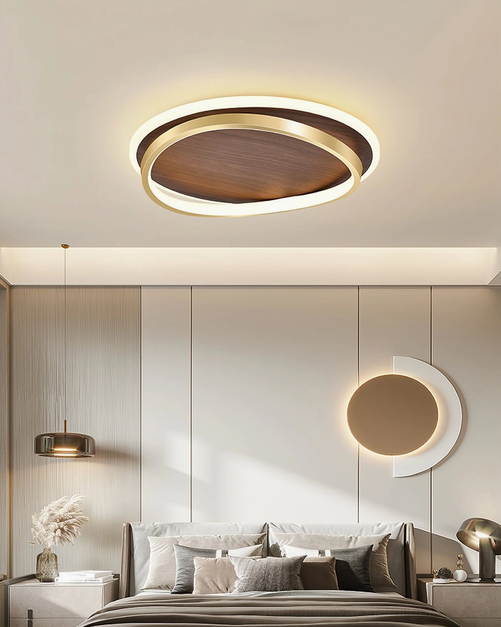 Soft warm LED ceiling light in modern bedroom with wall art and pendant fixtures, Nordic design flush-mount illumination