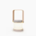 Nordic honeycomb portable lantern table lamp with integrated LED, shown from frontal view in studio setting, featuring white and natural wood finish