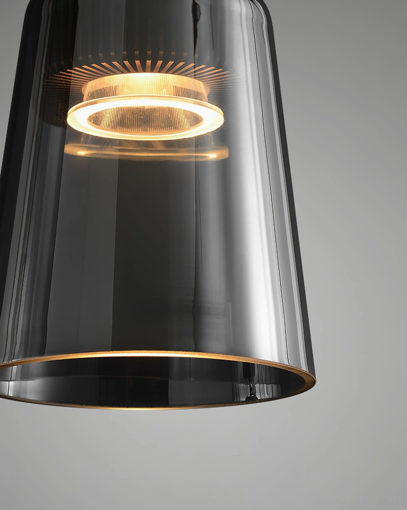 Modern Nordic-inspired smoke grey cone pendant providing focused task and accent lighting