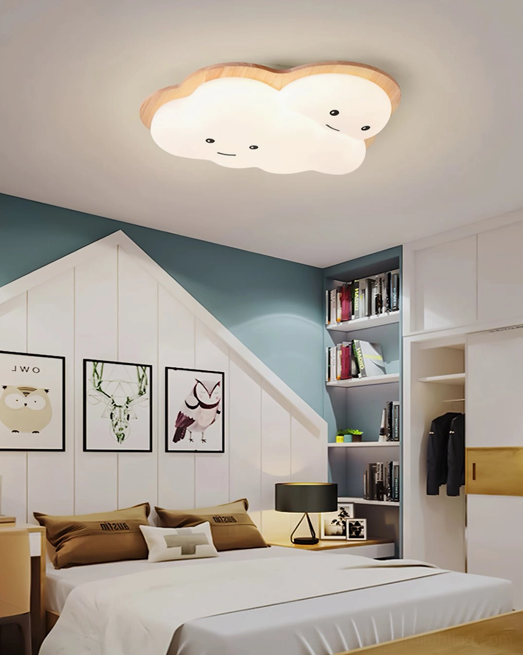 Warm-lit smiling cloud ceiling lamp in fresh Nordic kids bedroom with built-in bookshelf and natural tones