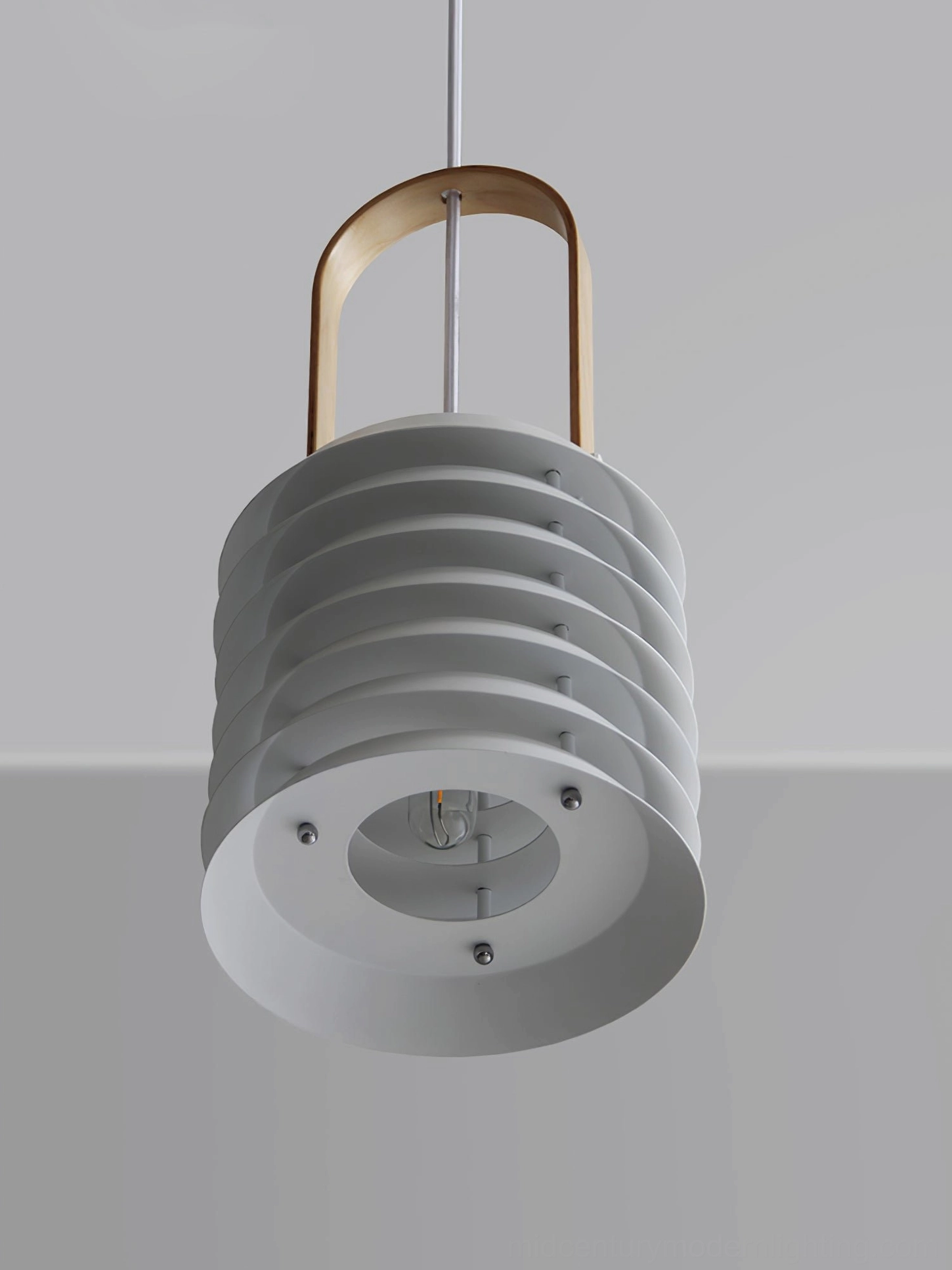 Nordic minimalist lantern pendant creating soft diffused lighting in contemporary interior