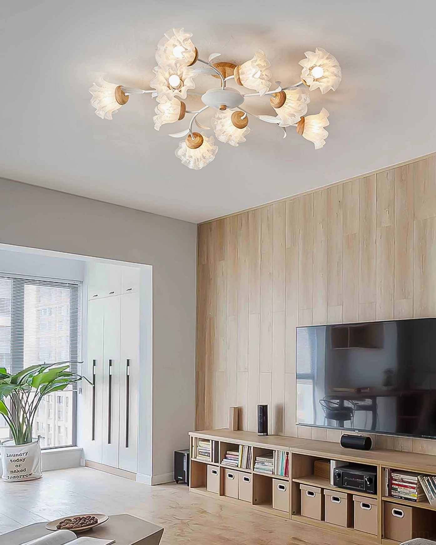 Floral branch ceiling light in contemporary Nordic living room with TV wall, minimalist décor