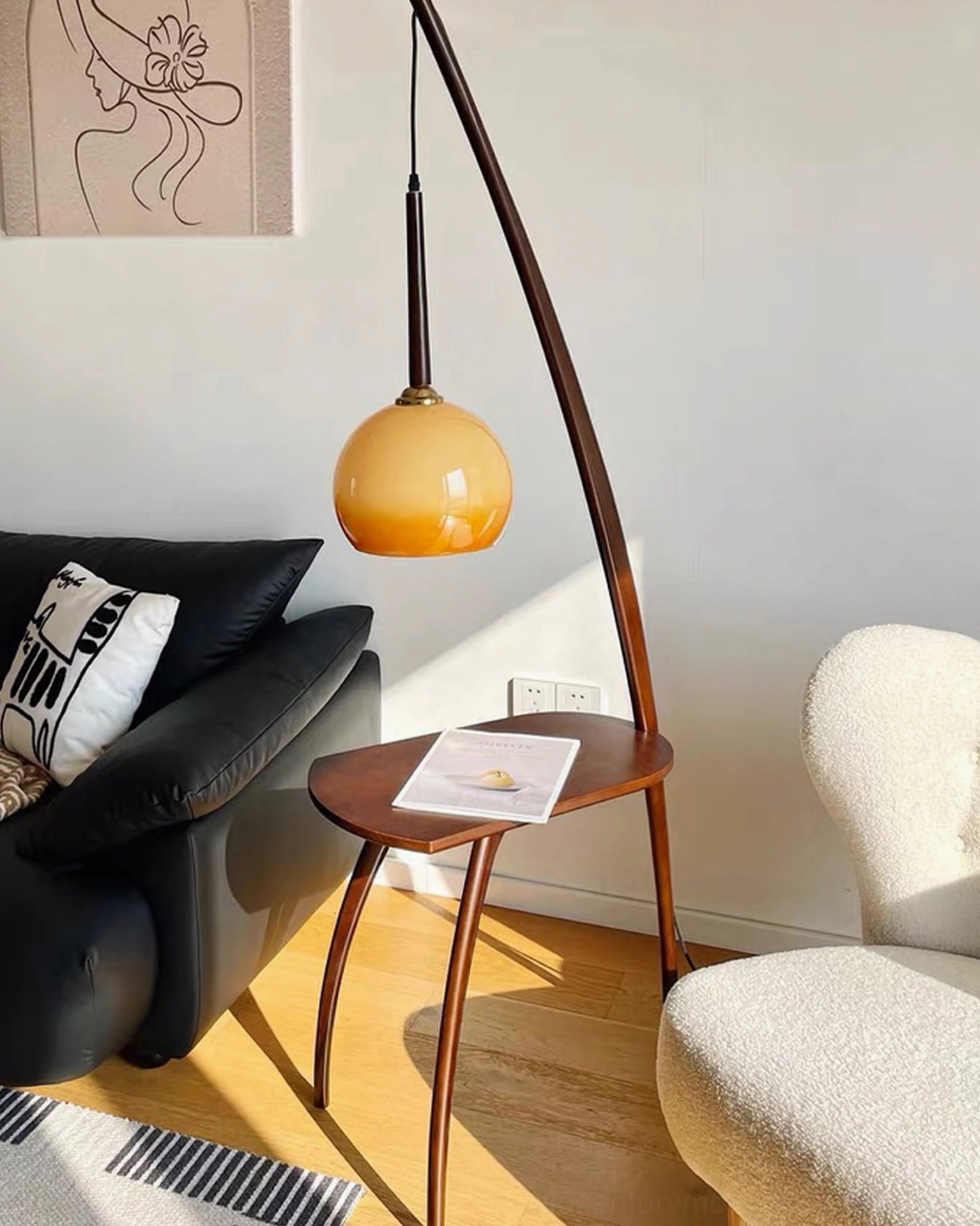 Mid-century modern arc floor lamp with side table in Nordic living room, warm amber glass shade, wooden furniture