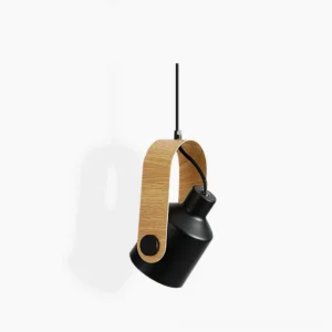 Single matte black Nordic pendant light with wood grain accent strap, adjustable head design, minimalist Scandinavian fixture, studio view