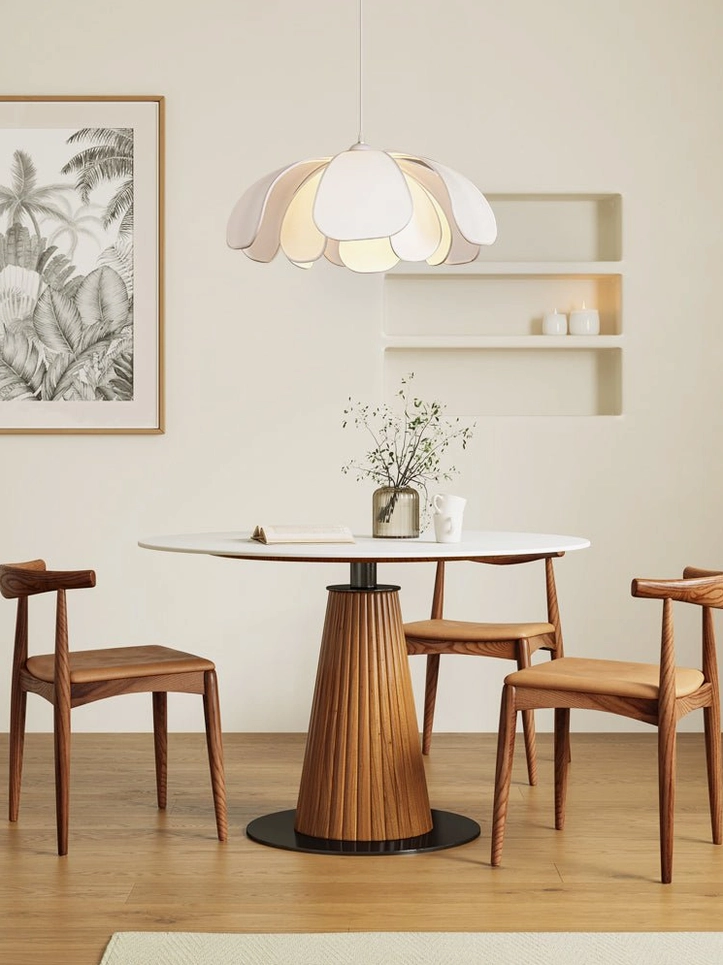 Norm white petal pendant lamp overhead view mid-century modern dining room wooden table