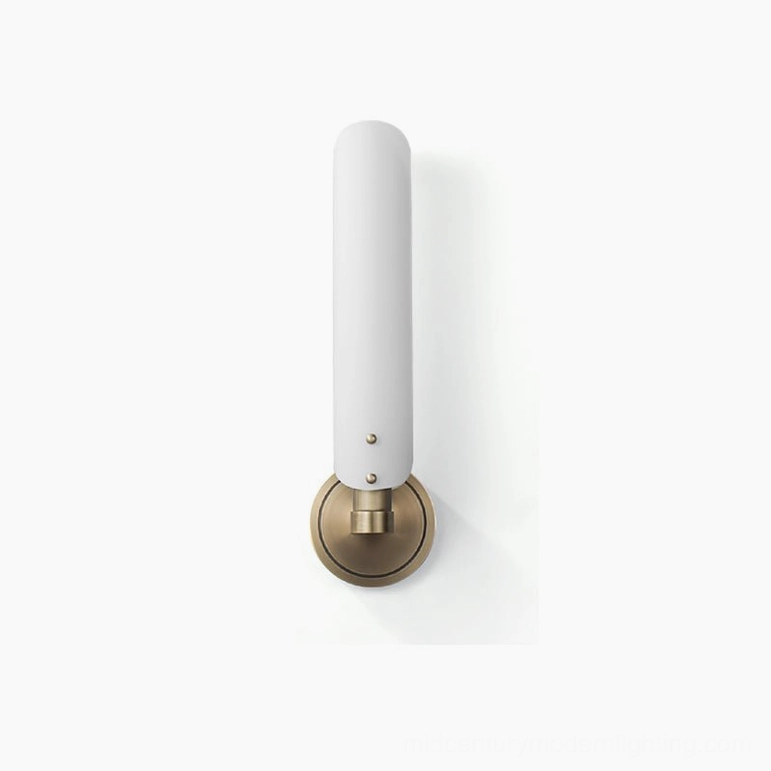 Compact Norwalk single-arm wall sconce with brass construction and frosted white glass shade