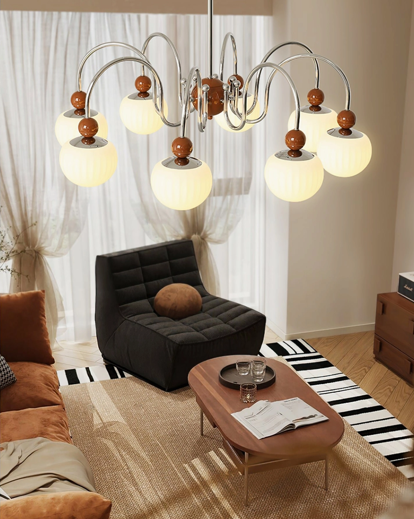 Notti mid-century modern 8-head chandelier with frosted glass globes in contemporary interior design setting