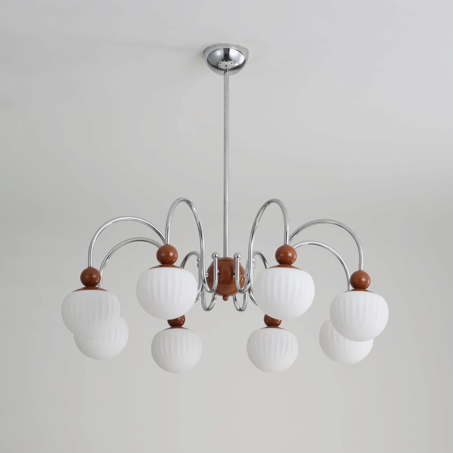 Notti mid-century modern chandelier showing balanced symmetry and graceful arm articulation design philosophy