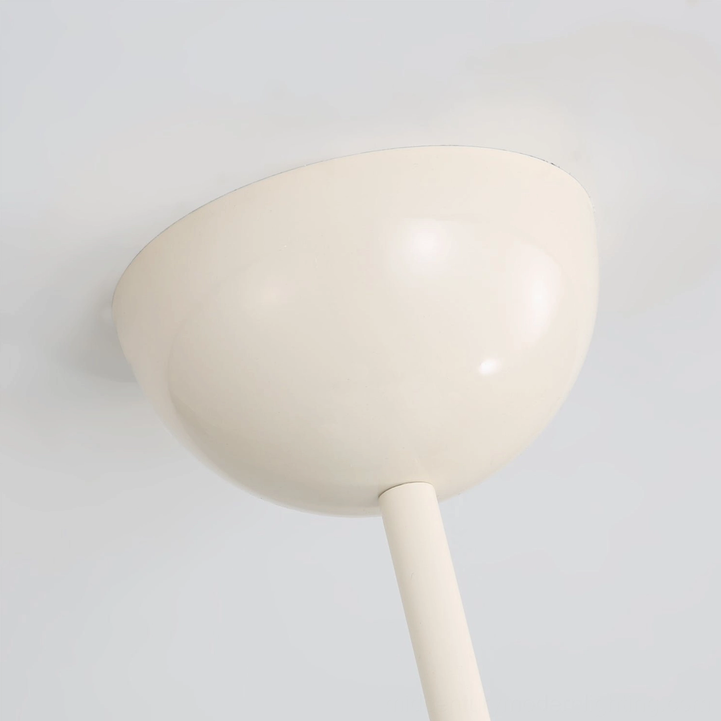 Notti chandelier ceiling mount canopy close-up showing smooth matte off-white finish and metal hanging rod