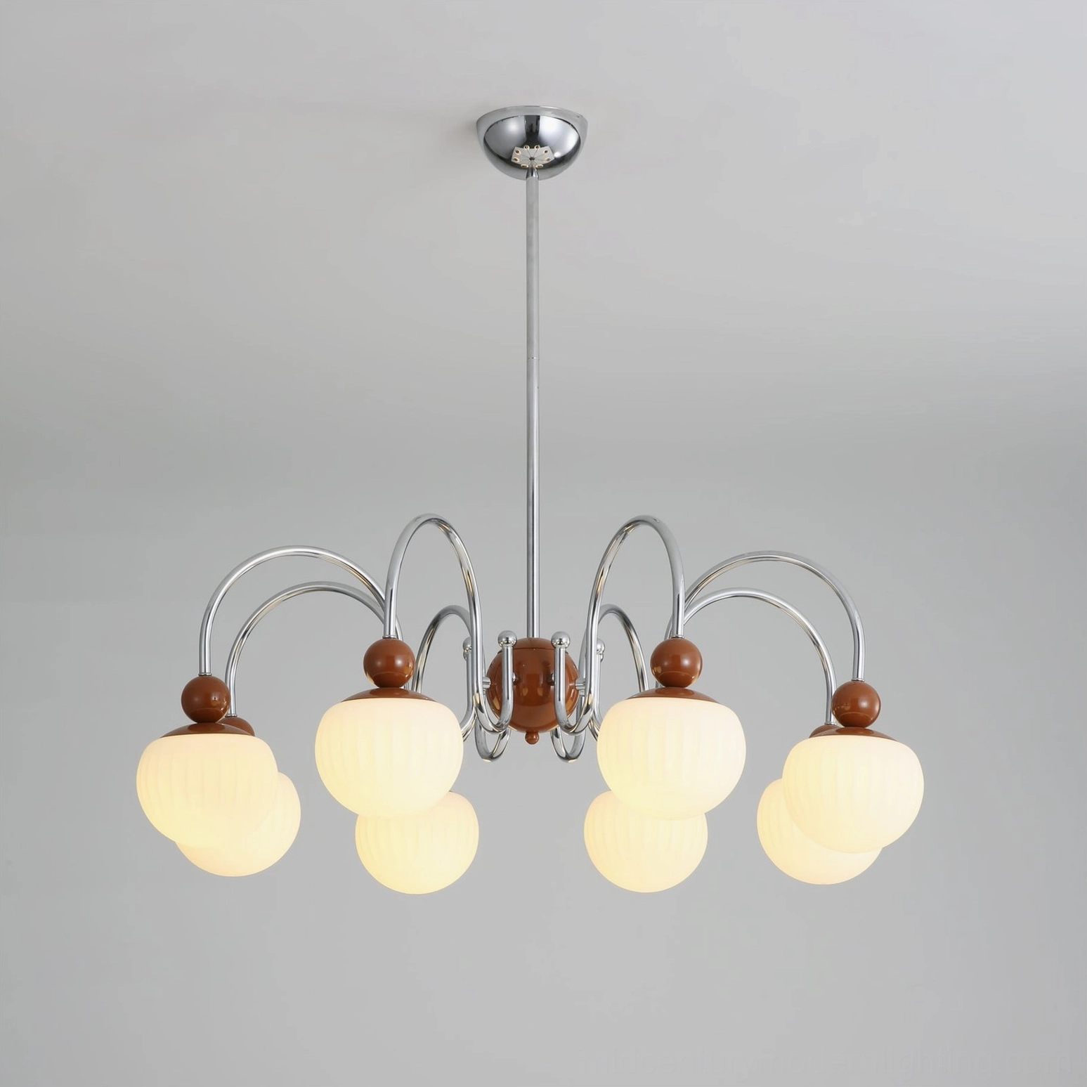 Notti chandelier cream finish frame with spherical decorative elements and organic curved arm geometry