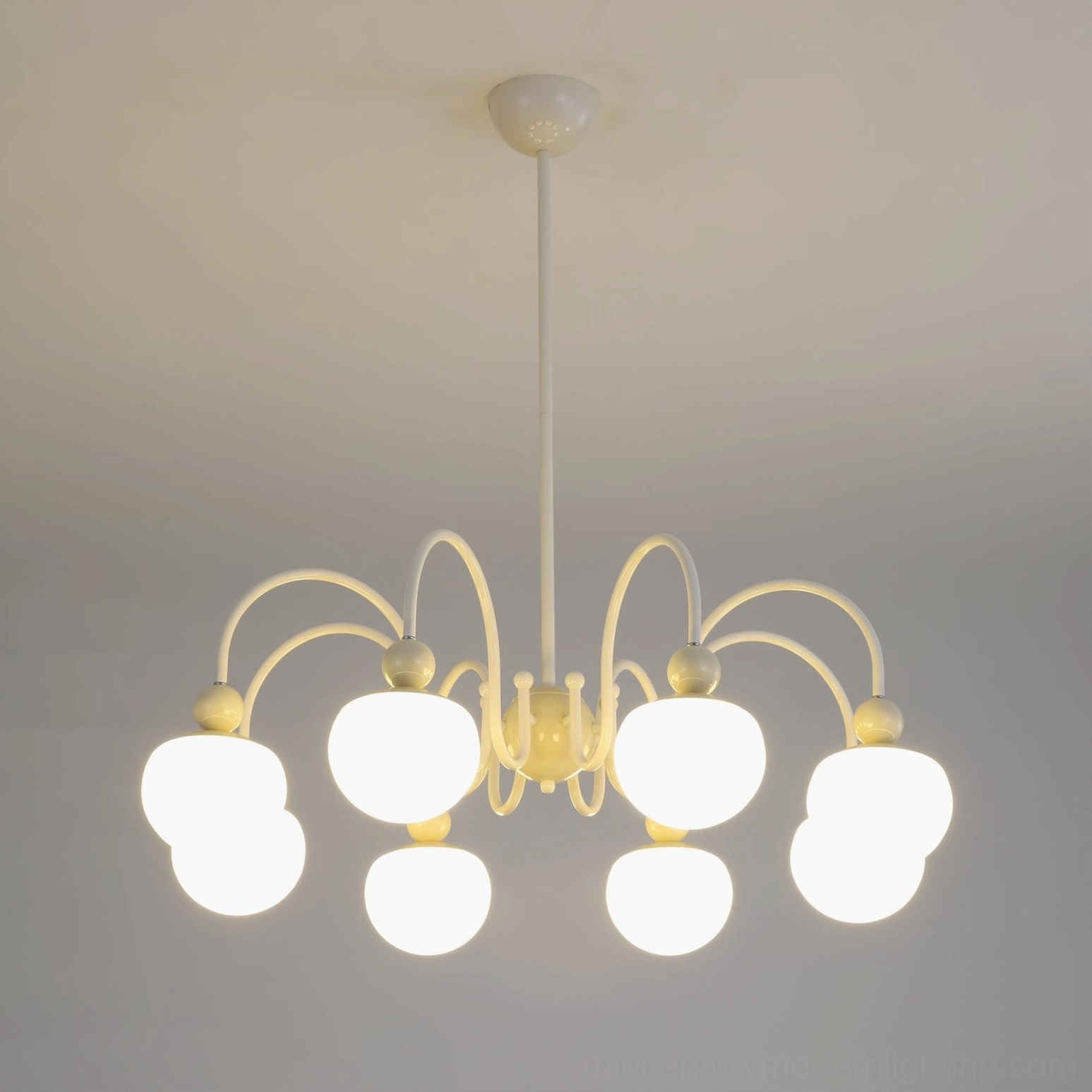 Notti chandelier Edison bulb option showing vintage-inspired warm glow through frosted glass shades